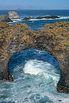 Gatklettur Arch and Arnarstapi sea stacks, Snaefellsnes Peninsula, Iceland, May 2021.