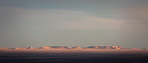 Island mountains in the Reg Labyad. Western Sahara, Africa. February, 2020.