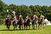 First Empire Military Re-enactment: People dressed in uniform - from left: Prince De Salm, Marechal Murat, four Second Regiment de Hussards on horseback, Chateau du Plessis-Bourre, Maine-et-Loire, Fra...