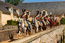 First Empire Military Re-enactment: People dressed in uniform - from left: four Second Regiment de Hussards, Marechal Murat, Prince De Salm, two Lanciers Polonais, and two Second Regiment de Hussards...