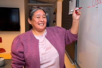 Tukumeq Qaerngaq, an Inuit woman who works as vice principal of a school in Qaanaaq, Northwest Greenland, 2021.