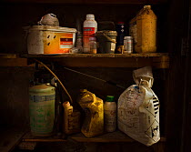 Insecticides and agricultural chemicals in a farmer's store room, Somerset, England. September.