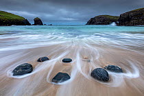 Incoming tide at Dal Beag beach, Isle of Lewis, Outer Hebrides, Scotland, UK. July.
