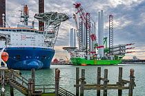 Installation vessels Apollo and Vole Au Vent moored at REBO heavy load terminal, loading wind turbines for SeaMade wind farm, Ostend port, Belgium, October, 2020.