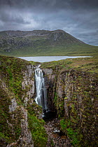 Wailing Widow Falls and Loch Gainmhich on an overcast day, Assynt, Scottish Highlands, UK. August.