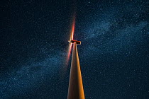 Wind turbine under a starry sky crossed by the Milky Way, Babolna wind farm, Babolna, Hungary. July. 2020. Hungary Nature Photographer of the Year Competition 2021 - Sustainable Energy and Nature cate...