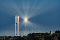 Planta Solar Tower 20, with focused sun rays out of focus. This is part of the Solucar solar complex owned by Abengoa energy, in Sanlucar La Mayor, Andalucia, Spain. January, 2020.
