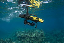 Queensland University's "LarvalBot", a semi autonomous underwater robot that will distribute baby coral as "larval clouds" onto damaged reef areas on a larger scale. "Larvalbot" was developed by Profe...
