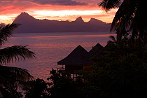 Sunset on Papeete with Moorea Island in the background, Tahiti, French Polynesia, Pacific Ocean. September, 2008.