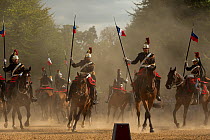 Garde Republicaine performing during First Empire reenactment for the bicentenary anniversary of Napoleon Bonaparte's death, Chateau de Versailles, France.  2021