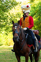 Trompette soldier from the 4th Regiment of Hussards. First Empire reenactment for the bicentenary anniversary of Napoleon Bonaparte's death, Chateau de Versailles, France. 2021