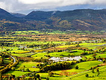 View from Latrigg of floodwaters across farmland at the head of Bassenthwaite Lake, Lake District National Park, Cumbria, UK. October, 2021.