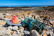 Marine plastic waste washed ashore, Holy Island, Northumberland, North Sea, UK. May, 2021.