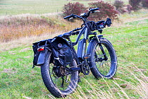 A 'Rad' all-terrain electric bike in a field, UK. October, 2020.