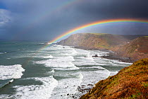 Rainbow over the clifftops along the North Cornish coast, Morwenstow, Cornwall, UK. September, 2020.