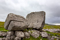 The Cheese Press stone, two huge limestone boulders,  Kingsdale, Yorkshire Dales National Park, Yorkshire, UK. August, 2020.