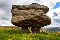 The Norber Erratics, glacial deposits of Silurian greywacke sandstone rock, perched on top of limestone, Austwick, Yorkshire Dales National Park, Yorkshire, UK. July, 2020.