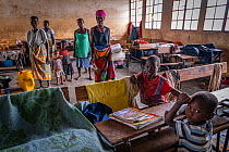 Families living at primary school temporarily converted into shelter after Cyclone Idai. Outskirts of Gorongosa National Park, Mozambique. March 2019.