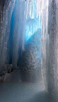 Frozen waterfall inside an ice cave, Putoransky State Nature Reserve, Putorana Plateau, Siberia, Russia. May.