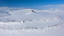 Snow covered plateau with rocky outcrops, Putoransky State Nature Reserve, Putorana Plateau, Siberia, Russia. May, 2021.