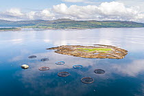 Aerial view of salmon farm pens in Loch Na Keal, Isle of Mull, Scotland, UK. July, 2019.