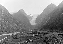 Village in Olden valley, against Melkevollbreen glacier, part of Jostedalsbreen glacier, Vestland, Norway.  Photo: Knud Knudsen 1880-1890. Collection: UBB, Bergen   See 1698534 for image of same vall...