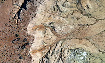 Aerial view of desert showing showing erosion, rivulets and channels formed by rainwater, Anna Creek Station, South Australia. March, 2022.
