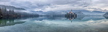 Lake Bled and the Church of the Assumption of St. Mary at dawn, Bled, Slovenia. February.