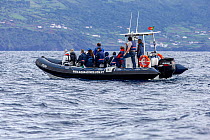 People on whale watching zodiac boat. Pico island, Azores, Atlantic Ocean.