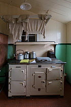Kitchen in museum display inside former British Base A, now a museum and post office at Port Lockroy, Goudier Island, Antarctic Peninsula, Antarctica.