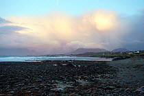 Village of Ardnagreevagh after squall passed over coast of Connemara, Galway, Ireland. February.