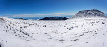 Rare snowfall near summit of Haleakala Crater, dormant volcano in Haleakala National Park, Maui, Hawaii.  Four image files were combined for this panorama.