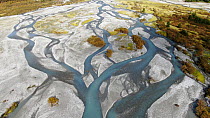Aerial tracking shot of glacial river delta, Jostedalen National Park, , Norway.