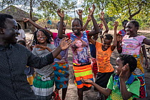 Group of girls with the group leader, participating in group activity at 'Girl's Club' in the village of Samora Rachel, Gorongosa National Park, Mozambique. June, 2018.