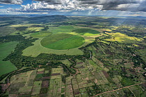 Aerial view of small scale agriculture, predominantly millet crops, along the Mara River, Northern Mara area, Kenya, Africa. November, 2019. The Mara River flow is reduced as water is taken from it to...