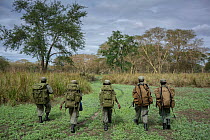 Five female park rangers on patrol, part of an all female ranger patrol, Gorongosa National Park, Mozambique. June, 2018.