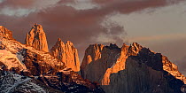 Sunrise on the 'Towers' and Torres del Paine massif, Torres del Paine National Park / Estancia Laguna Armarga, Patagonia, Chile. June, 2022.