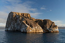 Kicker Rock, remains of volcanic lava cone, at sunset, San Cristobal Island, Galapagos National Park, Galapagos Islands. October, 2022.