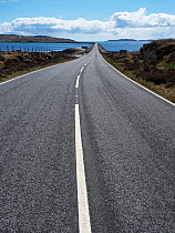 Causeway across Sound of Eriskay leading to island of Eriskay.  South Uist, Outer Hebrides, Scotland, UK. May.