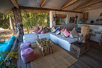 Beachside lounge at Kaya Mawa Lodge, Likoma Island, Lake Malawi, Malawi, Africa. November, 2017.