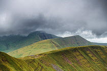 Fan y Big, Cribyn and Pen y Fan viewed from the south east, with storm clouds approaching. These are three glacial cwm's, corries / cirques carved into the Devonian, Old Red Sandstone escarpment,...