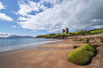 View along coastline and remains of Minard Castle, Minard Head, Dingle Peninsula, County Kerry, Republic of Ireland. September, 2022.