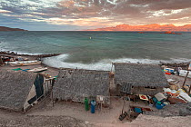 Fishing huts on island coastline.  El Pardito Island, Islands of Gulf of California Protected Area, Sea of Cortez, Mexico. May.