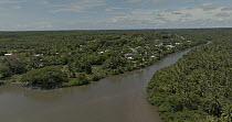 Aerial shot of small Fijian community located near a river, Naitasiri Province, Viti Levu, Fiji.