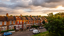 Timelapse of sun setting over houses, Graham Road, London, UK.