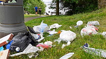 Rubbish left by visitors in Galava Park, Ambleside, Lake District, Cumbria, UK. June.