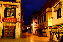 Barkhor kora, pilgrimage circuit in old centre of Lhasa, at night. Lhasa, Tibet, China.