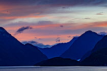 Mountains and fiord at dawn, Doubtful Sound, Fiordland, New Zealand, January.