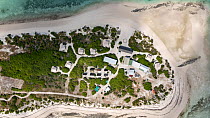 Aerial view of Blue Safari Eco camp on Wizard Island, Cosmoledo Atoll, Seychelles. April, 2023.
