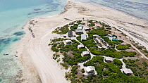 Aerial view of Blue Safari Eco camp on Wizard Island, Cosmoledo Atoll, Seychelles. April, 2023.